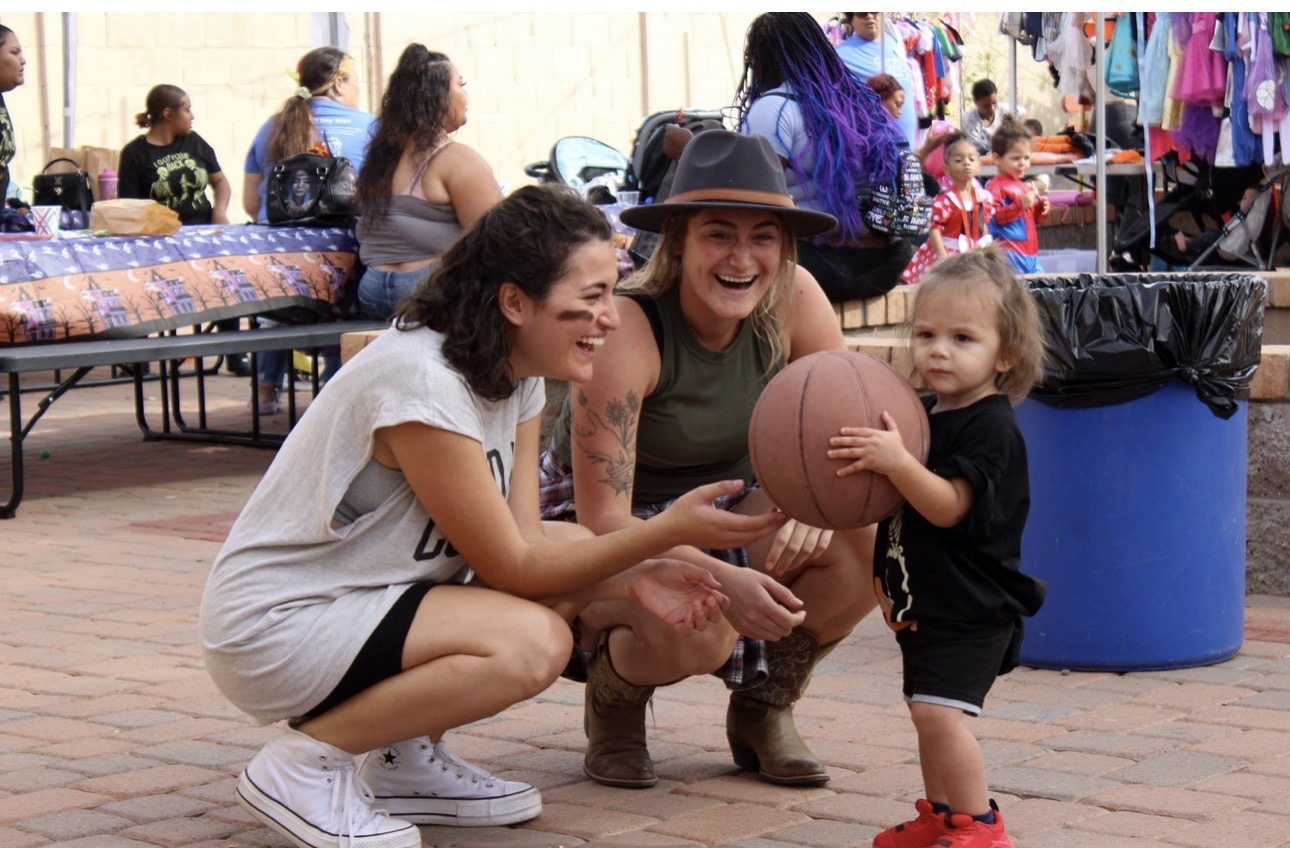 Community members engaging at an outdoor family event