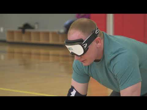 Participant playing goalball in an Outlook Nebraska activity